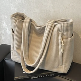 Tilda – Borsa a tracolla a coste con corda decorativa