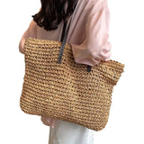 Liv | Borsa a tracolla intrecciata elegante
