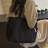 Tilda – Borsa a tracolla a coste con corda decorativa