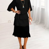 Sophie – Abito elegante fluido con volant